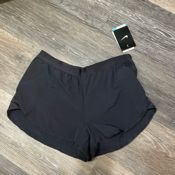 Nike Pants - NWT Nike dark navy blue women’s dry fit running athletic shorts M